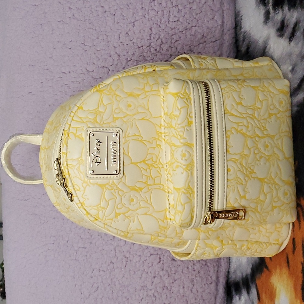 Loungefly Disney Winnie the Pooh Allover Embossed Print Mini Backpack